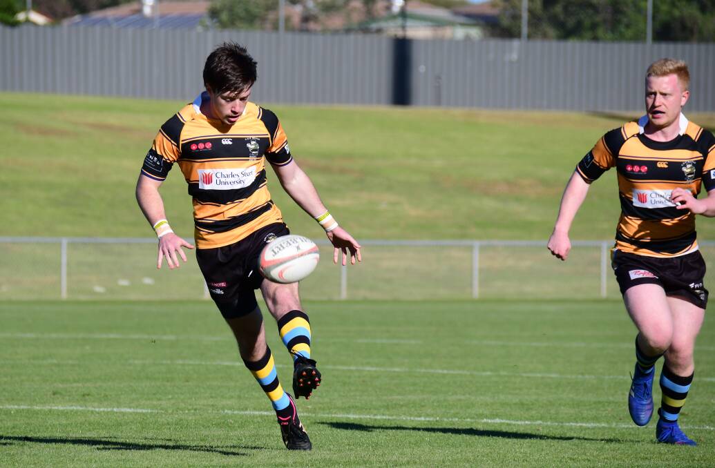 ON THE ATTACK: Star CSU flyhalf Ethan Cusick puts boot to ball. 