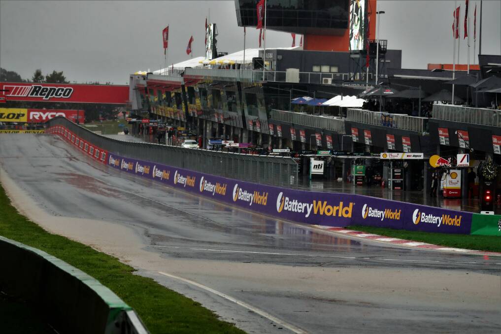 Torrential rain left standing water on the track at Mount Panorama on Saturday, forcing the cancellation of the top 10 shootout. Picture by Phil Blatch