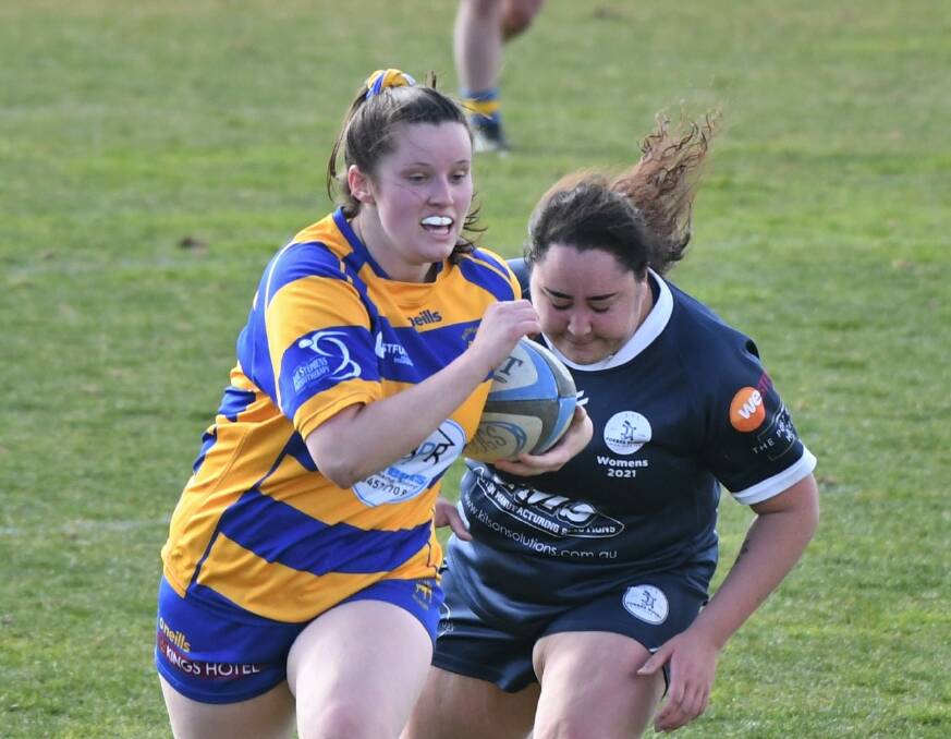 HIGHLIGHT: Bella McIntosh heads to the try line in the Bulldogs' win over Forbes. It was her first five-pointer for the Bathurst club. Photo: CHRIS SEABROOK