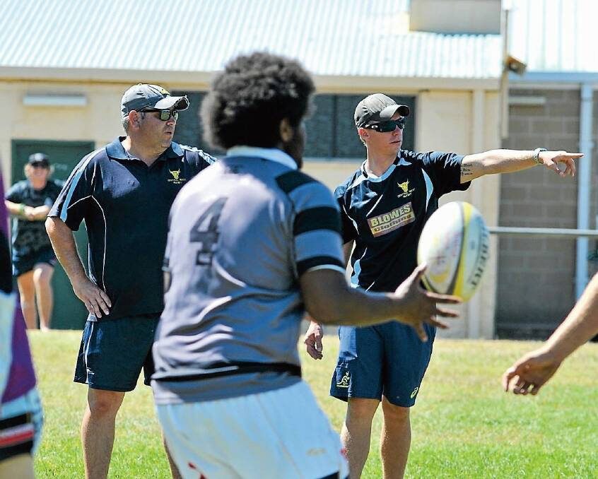 LEARNING: Scott Hatch, pictured left working with the Central West colts in 2016, is doing his World Level 3 coaching accreditation. Photo: JUDE KEOGH