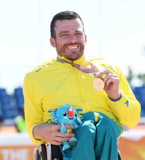 BETS MOMENT: Carcoar native Kurt Fearnley was voted as the athlete who produced the best sporting moment of the year when claimed gold at the Commonwealth Games. Photo: AAP