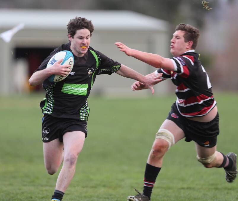 ON THE BURST: CSU winger Glenn Pollard sprints down the right wing in Saturday's win over Parkes. Photo: PHIL BLATCH