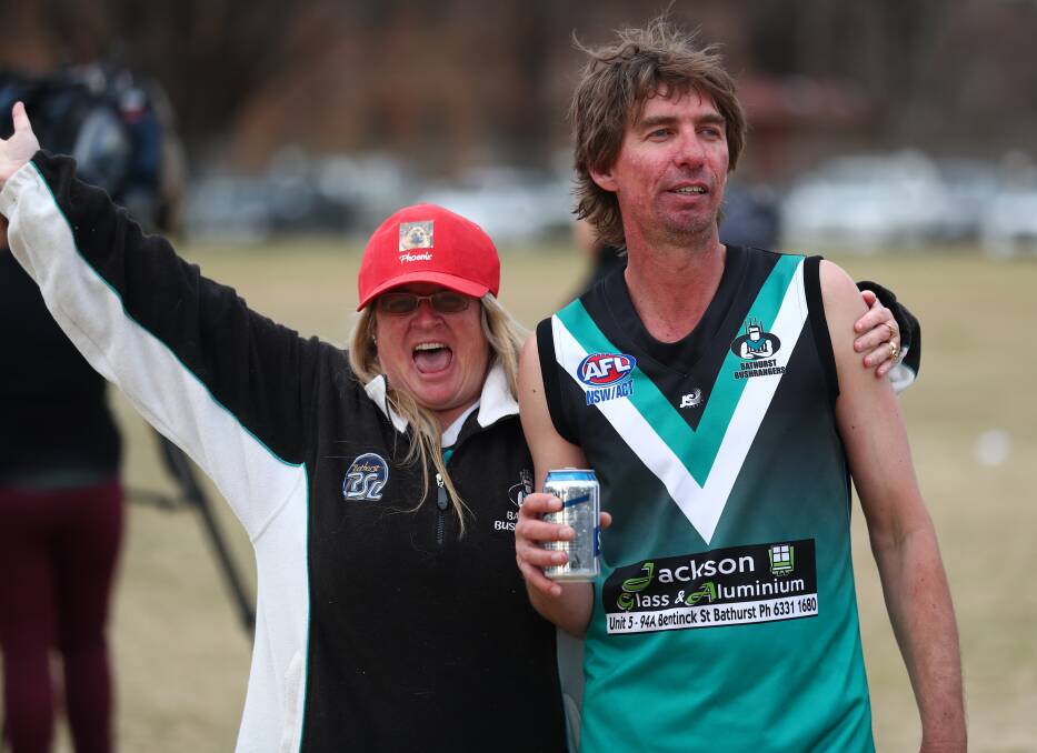 GOOD MEMORIES: John Ellis and his wife Wendy after the Bushrangers Outlaws won the 2017 AFL Central West grand final over Orange. Photo: PHIL BLATCH