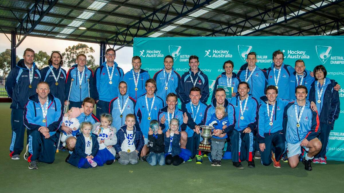 CHAMPIONS: Bathurst coach Jaden Ekert (back, left) with his championship winning NSW Country men's side. Photo: CLICKINFOCUS