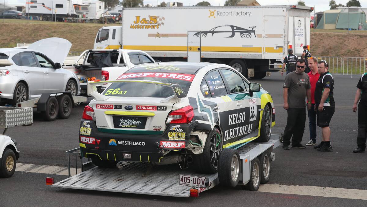 RACE OVER: The damaged Subaru of Brad Schumacher sits on a trailer in the back of the pits in the 2019 edition of the Bathurst 6 Hour. Photo: PHIL BLATCH