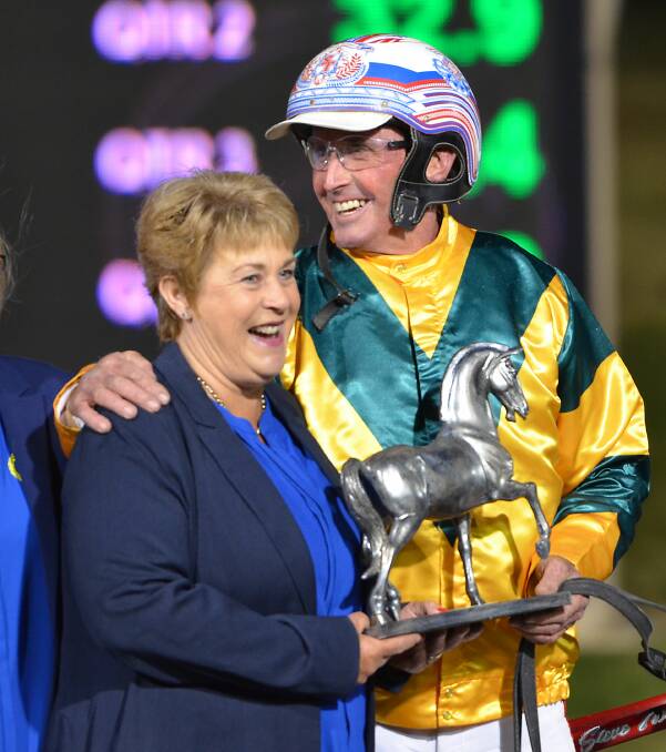 DELIGHTED: Steve Turnbull shares a laugh with Judy Frisby (Bedwells, sponsor) after winning the Star Trek Final. Photo: ANYA WHITELAW