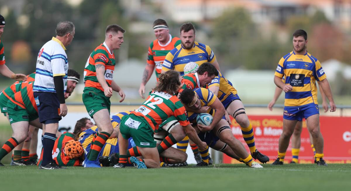 MUSCLING UP: While outclassed, Orange City tried hard against the Bathurst Bulldogs in Saturday's Blowes Clothing Cup match. Photo: PHIL BLATCH