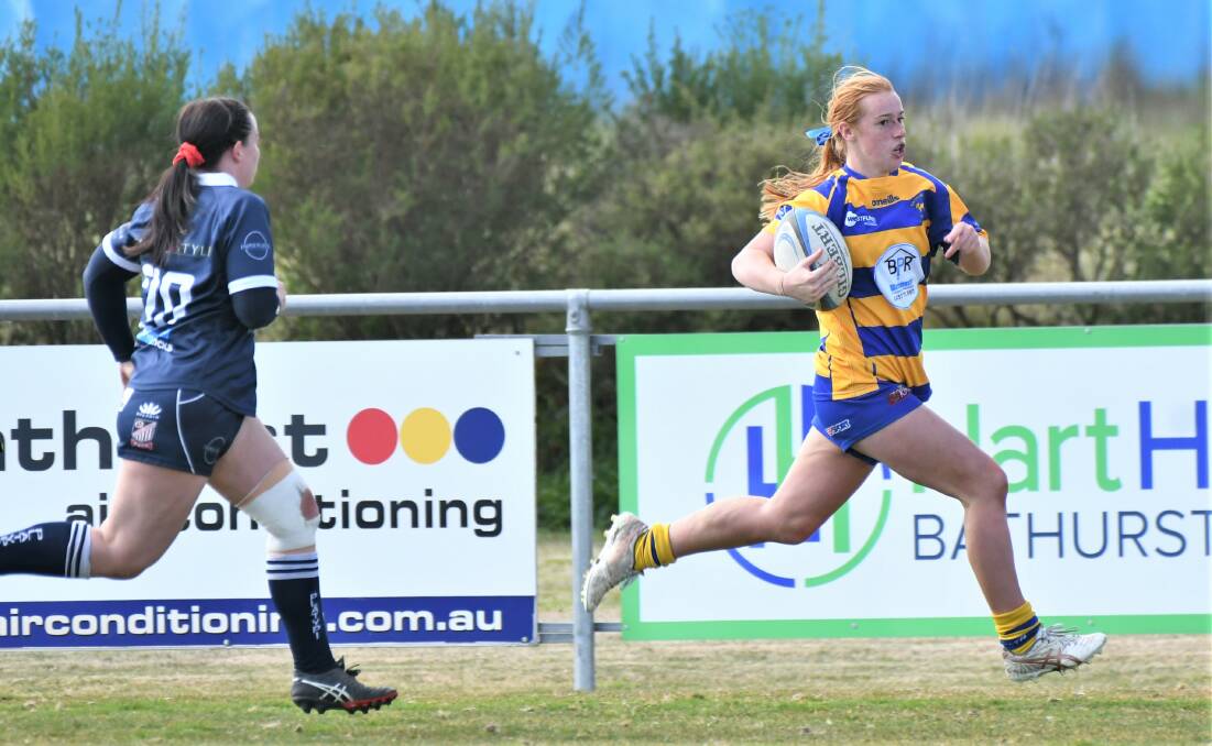 TALENT: Bathurst Bulldogs halfback Annie Craig runs away from a Forbes opponent in round 14. The two sides will meet again in a Ferguson Cup grand final qualifier after a draw alteration. Photo: CHRIS SEABROOK