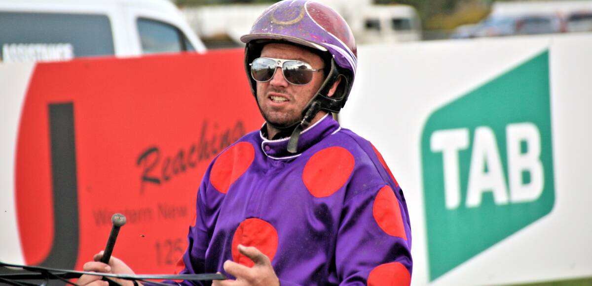HELPING HAND: Jason Hewitt drove a winning double at Parkes on Wednesday for his father-trainer Bernie. Photo: COFFEE PHOTOGRAPHY AND FRAMING