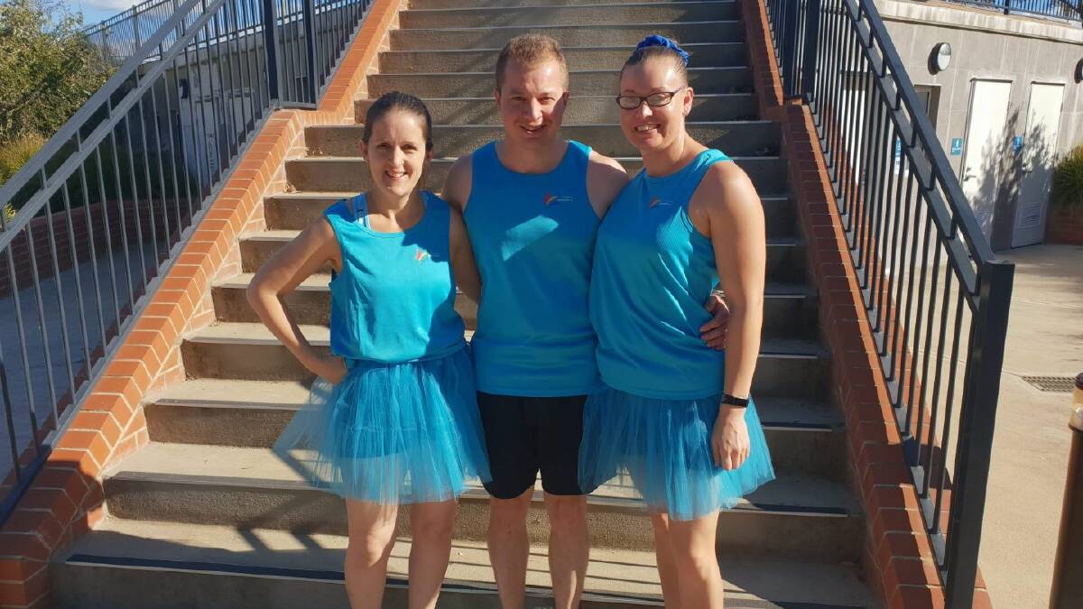 TIME TO CLIMB: Bathurst's Natalie Newman, Phil O'Brien and Jess Hammond will tackle the Stadium Stomp at the Sydney Cricket Ground.