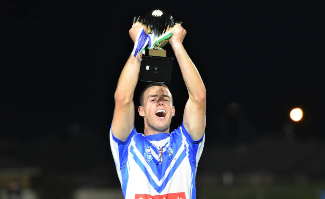 SUPER SKIPPER: St Pat's captain Cooper Neilsen, who was named joint player of the competition, hosts the Western under 21s premiership cup aloft.