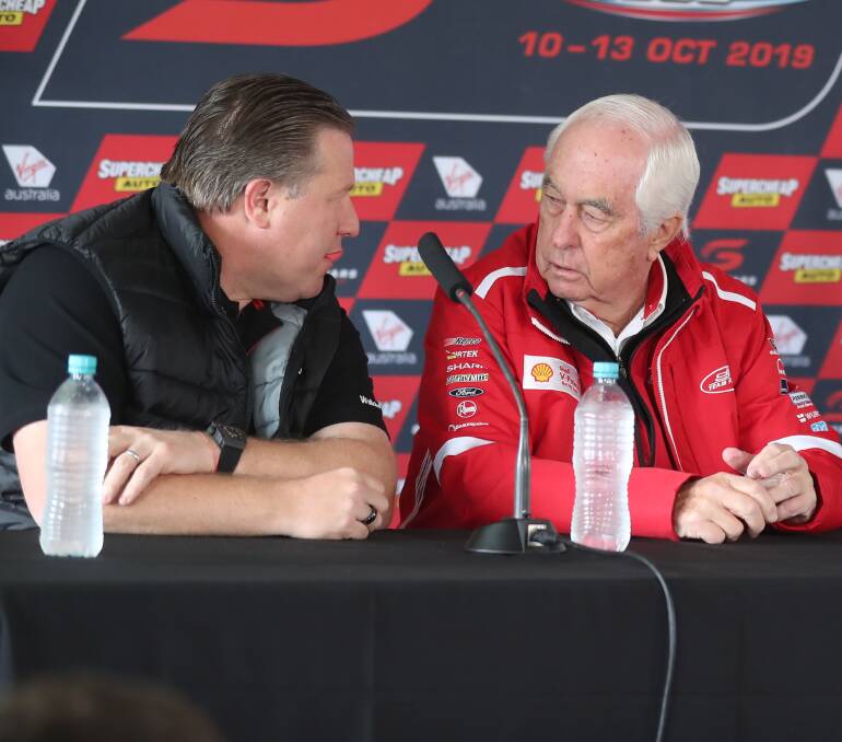TALKING SHOP: Supercars team bosses Zak Brown (Walkinshaw Andretti United) and Roger Penske (DJR Team Penske) chat during a media conference at the Bathurst 1000. Photo: PHIL BLATCH