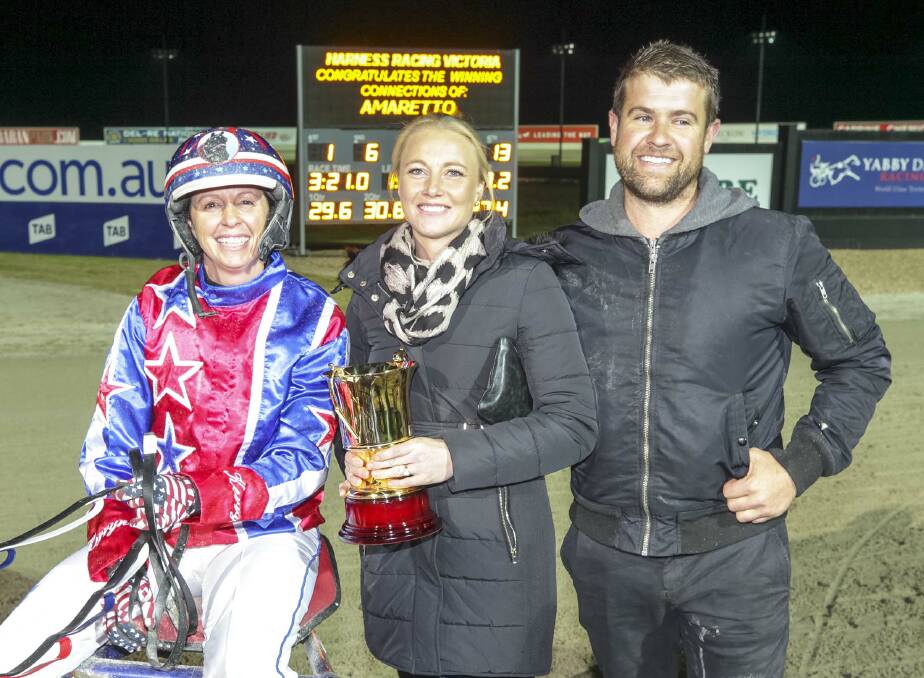 HIGHLIGHT: Kerryn Manning, Ashlee and Ryan Grives were all smiles after Ameretto's maiden Group 1 win. Photo: STUART McCORMICK