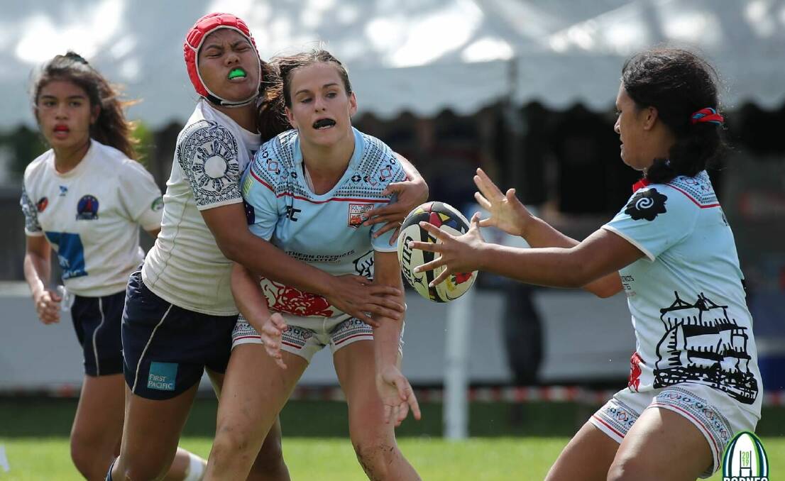 ON TOUR: Claire Woolmington in action at the Borneo 7s for Southern Districts.