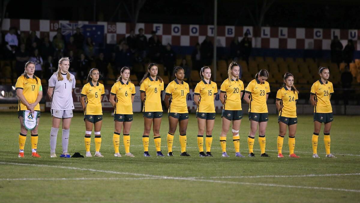PROUD MOMENT: Cushla Rue (#15) and her fellow Young Matildas line up for the national anthem. Photo: ANTHONY CAFFERY PHOTOGRAPHY