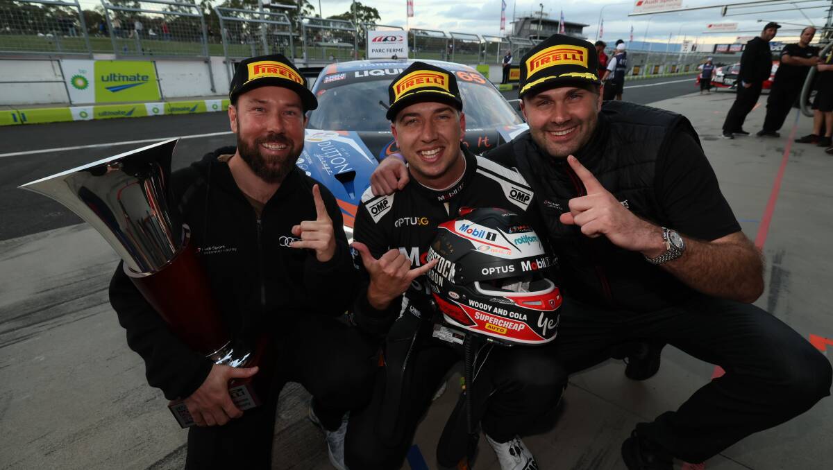 YOU BEAUTY: Chaz Mostert (centre) with team-mates Liam Talbot and Fraser Ross after claiming pole position in the Bathurst 12 Hour.