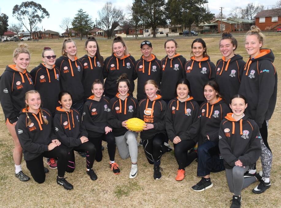 TITLE HOPEFULS: The Bathurst Giants youth girls side, coached by Steve Mann, who will take on Orange in Sunday's Central West AFL grand final. Photo: CHRIS SEABROOK