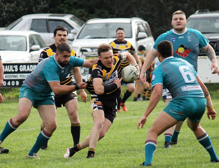 The Oberon Tigers booked their spot in the Mid West League Cup grand final with a 20-14 win over the Orange United Warriors. Photos: JOHN FITZGERALD