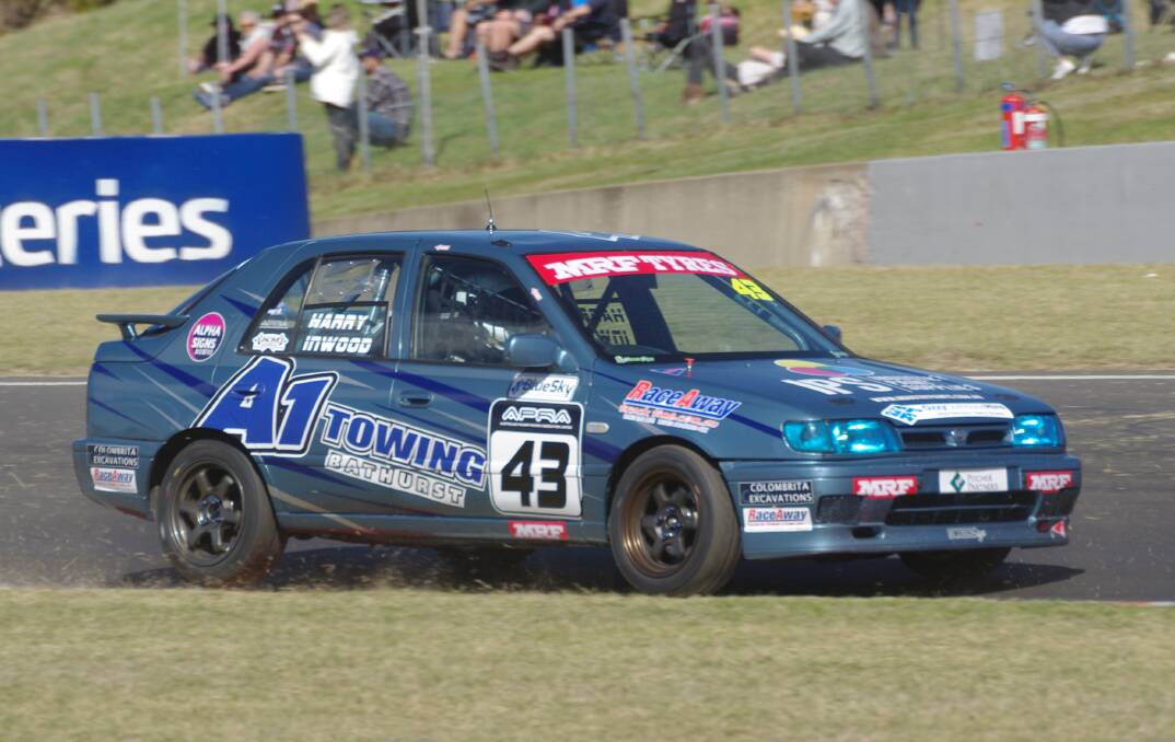 HAPPY EASTER: Harry Inwood claimed the chequered flag in the third Australian Pulsar Association race at Mount Panorama. Photo: WARREN HAWKLESS 