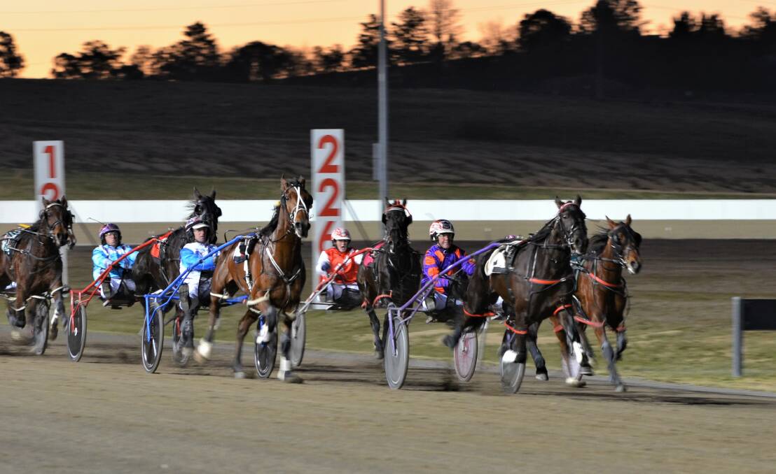 ON THE CHARGE: The Bernie Hewitt trained and driven Voodoo Lou leads the way down the home straight at the Bathurst Paceway on Wednesday night.