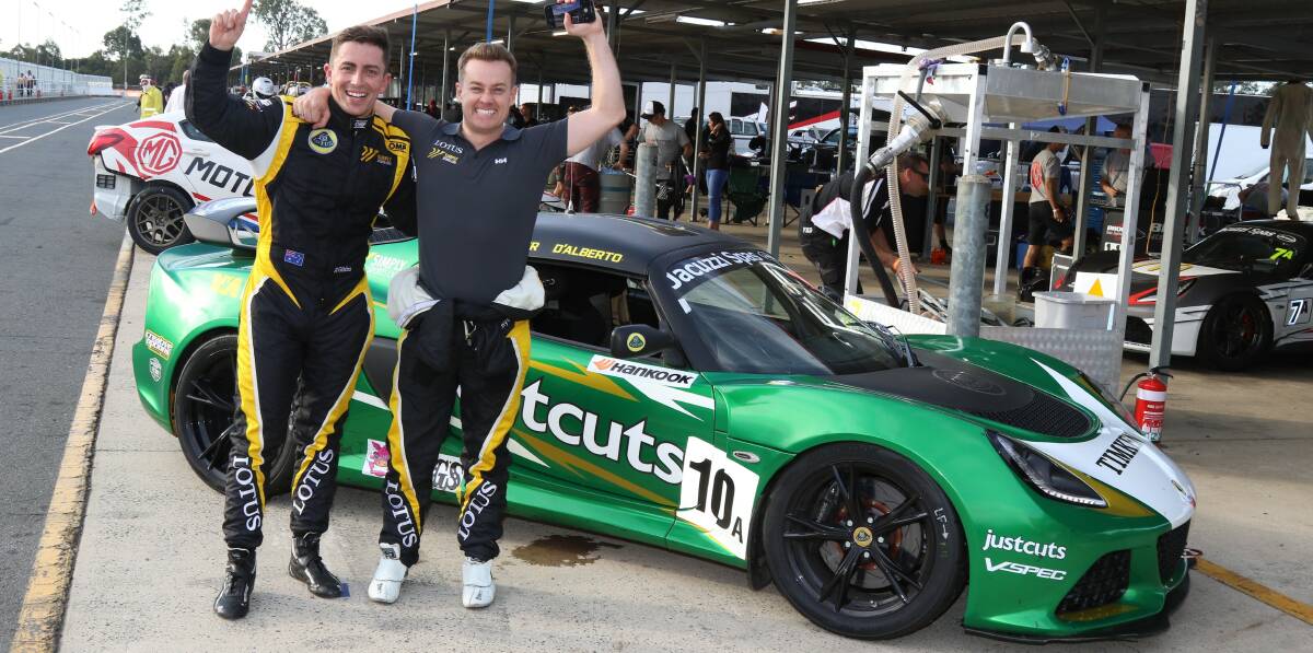 YOU BEAUTY: Grant Denyer (right) and Tony D'Alberto celebrate their win at Queensland Raceway. Photo: MATTHEW PAUL PHOTOGRAPHY
