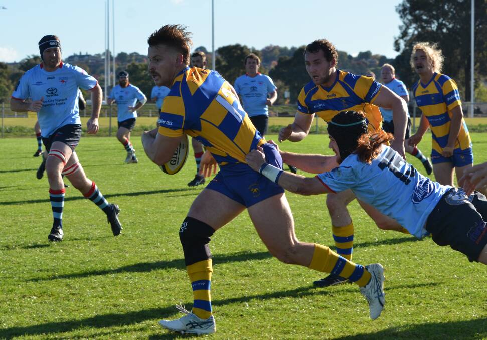 ON THE CHARGE: Adam Plummer heads towards the try line in Bulldogs' win against the Dubbo Roos. Photo: ANYA WHITELAW