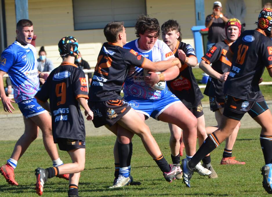 BIG SEASON: St Pat's prop Justin Hodgson works to make ground against fierce rivals Bloomfield Tigers. Photo: ANYA WHITELAW