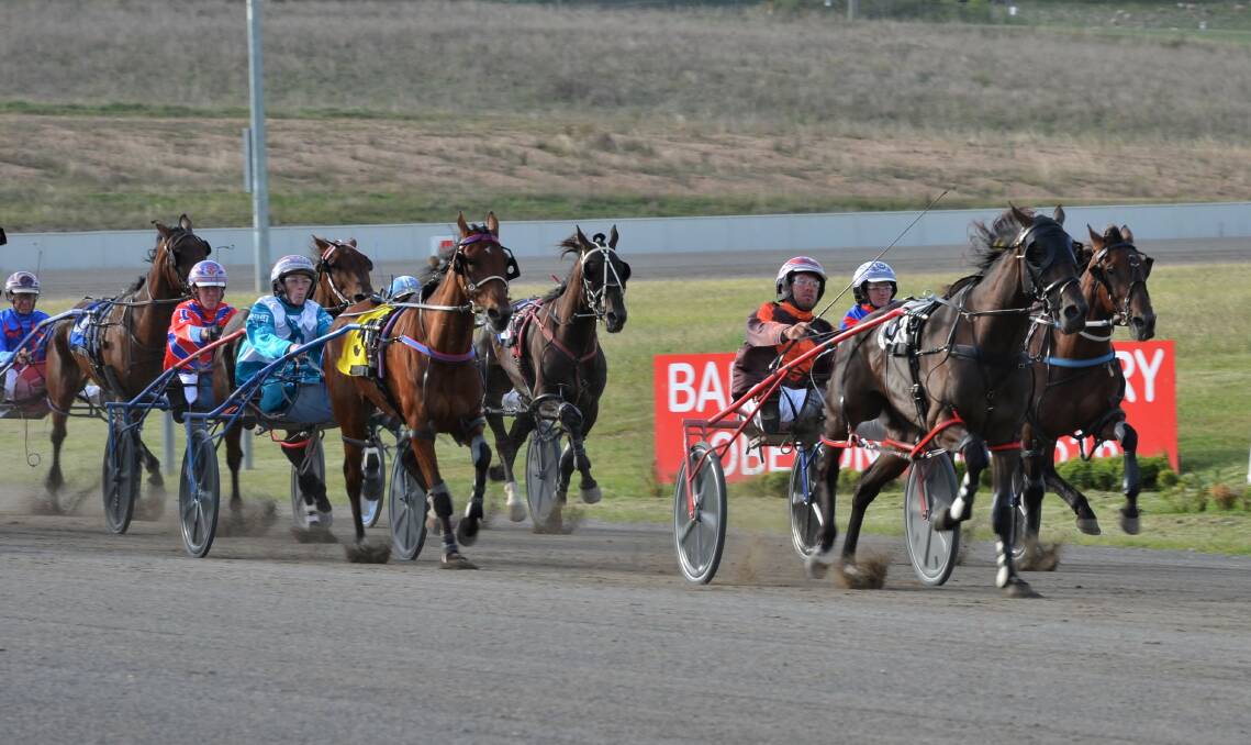 TOO STRONG: Semi Sensation sprints away from her rivals down the home straight at the Bathurst Paceway. Photo: ANYA WHITELAW
