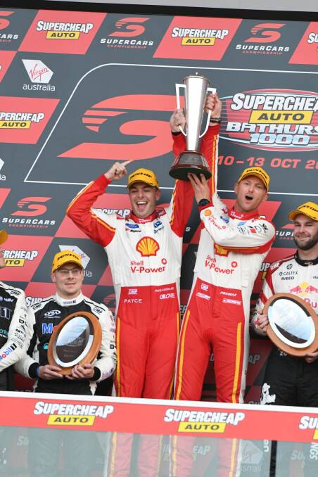HELPING HAND: Bathurst 1000 champion Scott McLaughlin (left) has joined other sporting stars in pledging his support to bushfire appeals. Photo: CHRIS SEABROOK