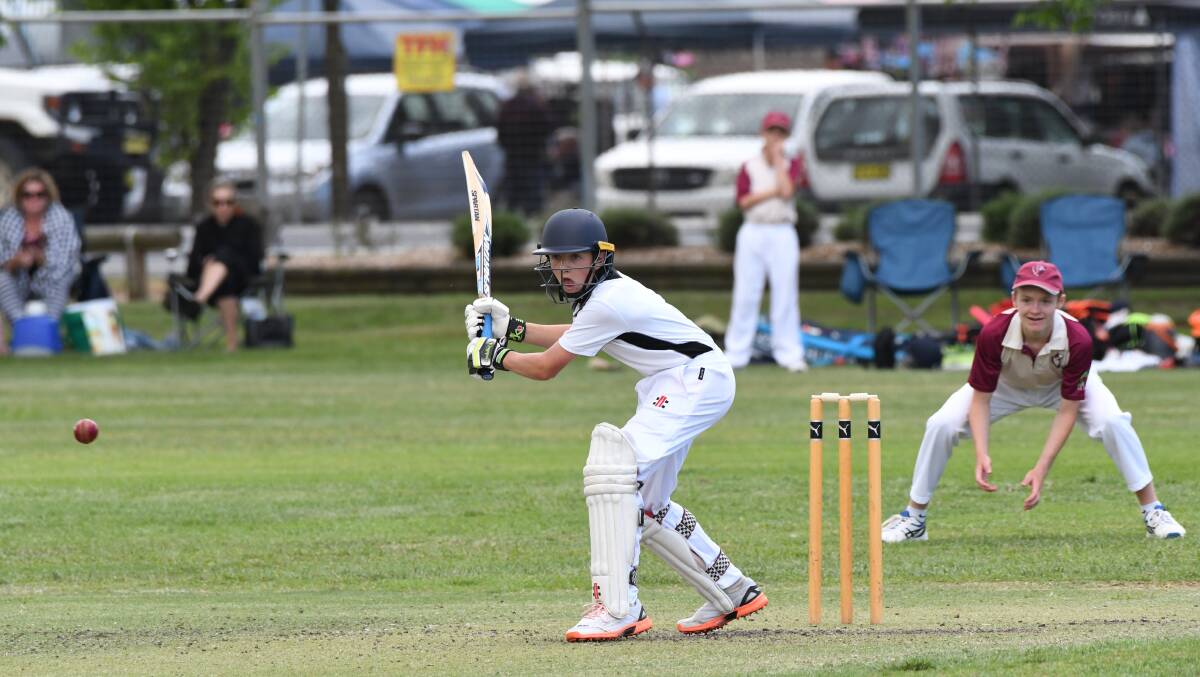 SCRAPE HOME: Angus Parsons and his Bathurst under 14s team-mates posted a one-wicket win over Mudgee on Sunday. Photo: CHRIS SEABROOK