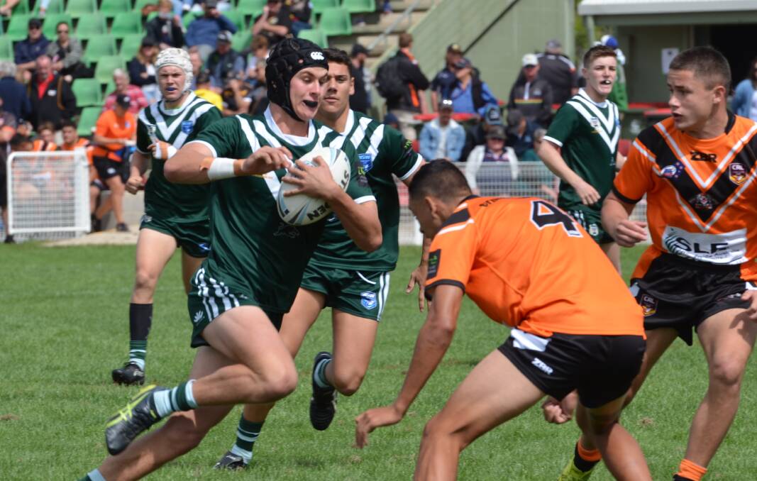 The Western Rams ran in 22 points in the second half to win their Laurie Daley Cup match 26-16 over the Tigers in Blayney on Sunday. Photos: ANYA WHITELAW