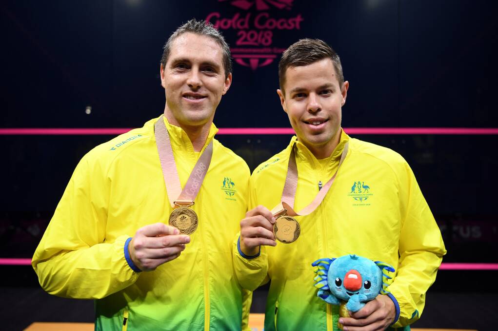 TOP NOTCH Zac Alexander (right) and David Palmer of Australia pose with their gold medals. Photo: AAP
