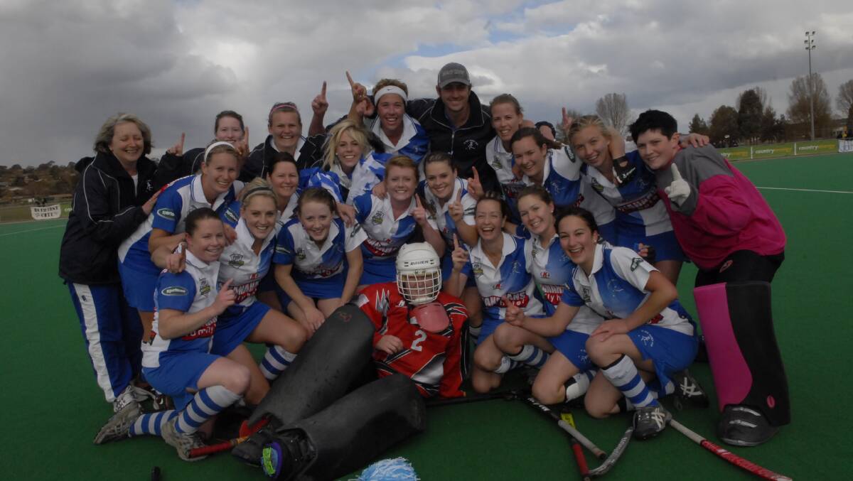 BACK ON DECK: Bec Clayton, pictured with the 2009 premiership winning Saints, is back as coach this season.