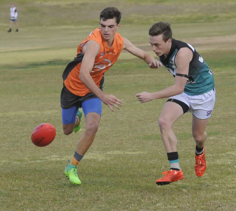 BRILLIANT SEASON: Bathurst Giant Nic Broes (left) had a stellar season 2017 in both under 16s and seniors. He won two club best and fairest awards and one for the league. Photo: CHRIS SEABROOK