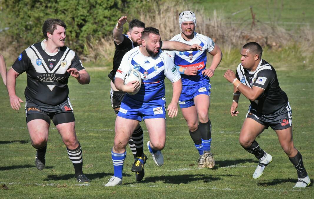 COMING THROUGH: St Pat's captain-coach Zac Merritt makes a charge during his side's Peter McDonald Premiership match against Cowra on Sunday. Photo: CHRIS SEABROOK