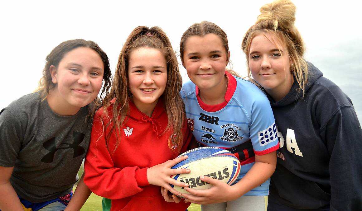 TACKLING A NEW SPORT: Panorama Platypi players Mia Dopper (14), Bonny Campiao (12), Samantha Hanrahan (12) and Rhiani Rozga (15) are loving the Western Women's Rugby League competition. Photo: ANYA WHITELAW