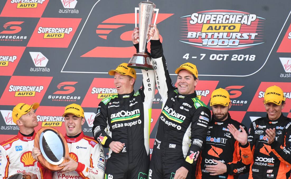 MIXED FEELINGS: Scott Pye (second from right) said it was a bitter-sweet moment to share the Bathurst podium with Craig Lowndes in 2018. 
