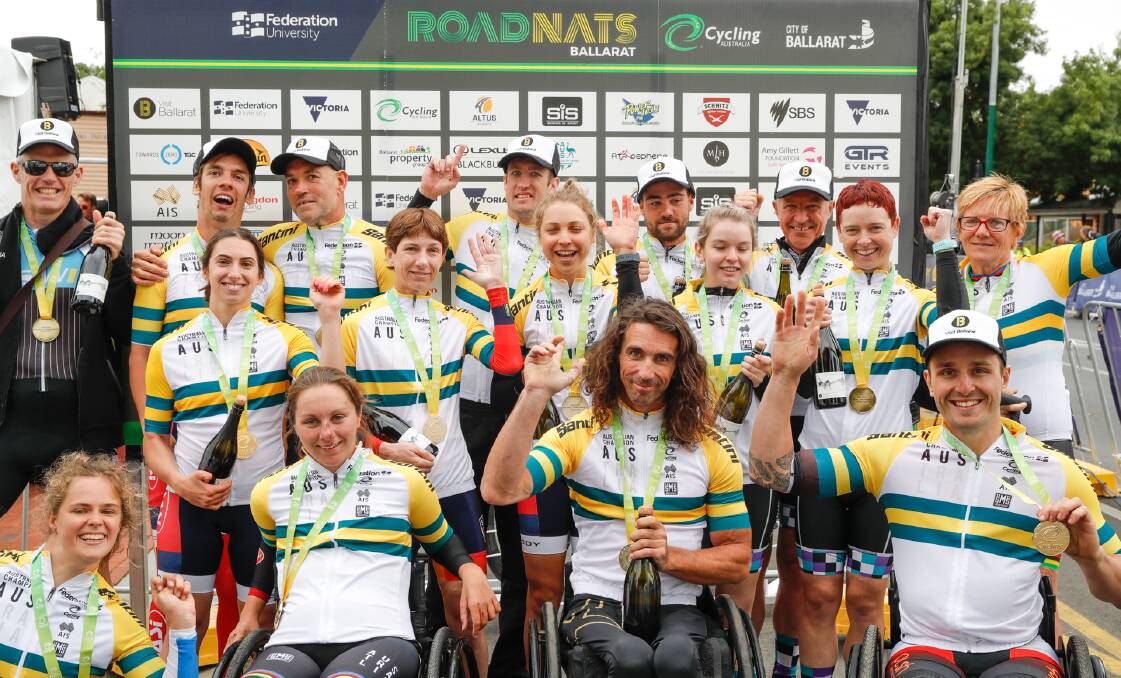 ROAD WARRIORS: Bathurst couple Emilie Miller (front, second from left) and David Nicholas (back, fourth from left) with their fellow Para-cycling road race gold medallists. Photo: CON CHRONIS/CYCLING AUSTRALIA
