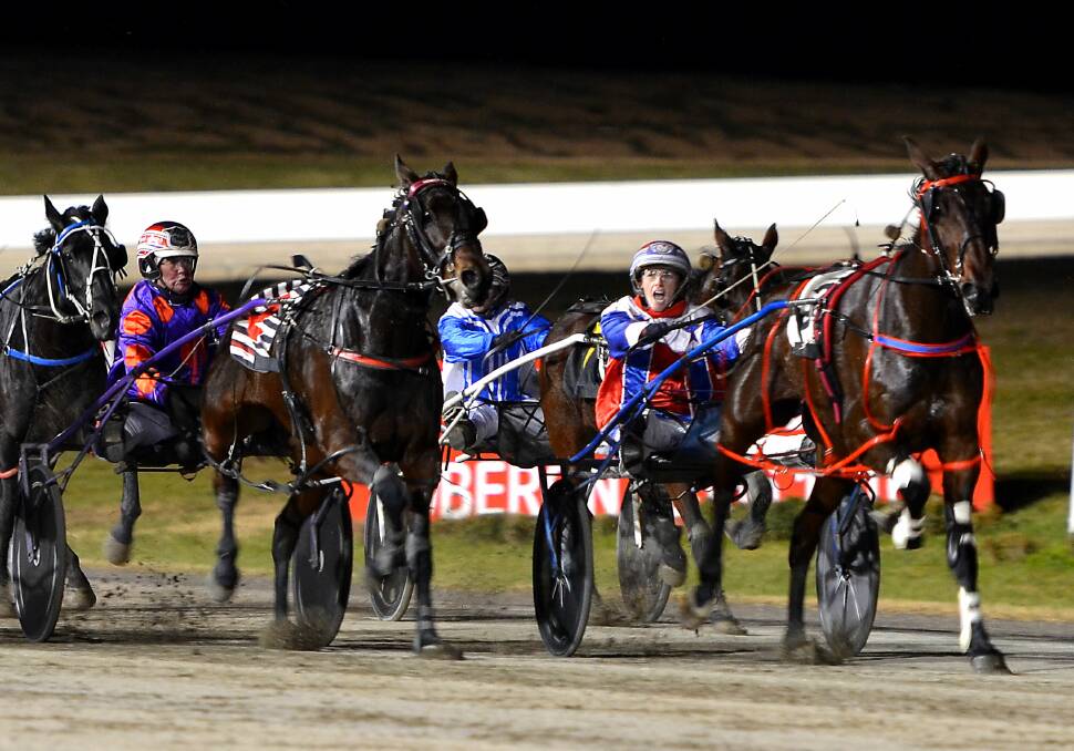 COME ON: Amanda Turnbull urges Akuma on down the home straight as the Bernie Hewitt driven No Nay Never threatens on the outside. Photo: ANYA WHITELAW