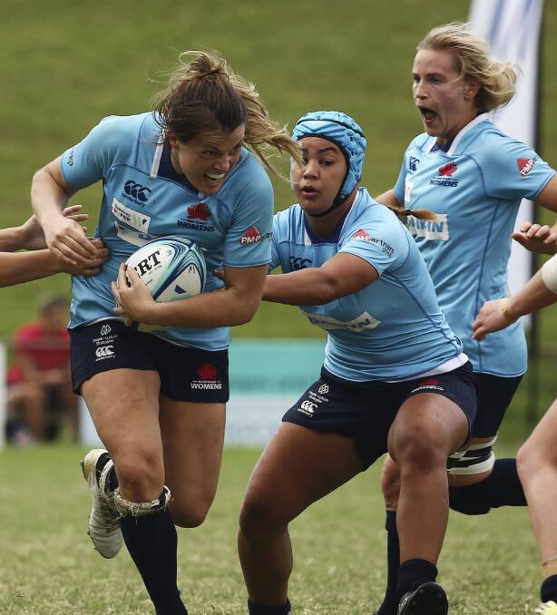 SUPER SEASON: Grace Hamilton led the NSW Waratahs to their fourth consecutive undefeated Super W premiership on Saturday, her side beating Queensland 45-12 in the decider. Photo: KAREN WATSON