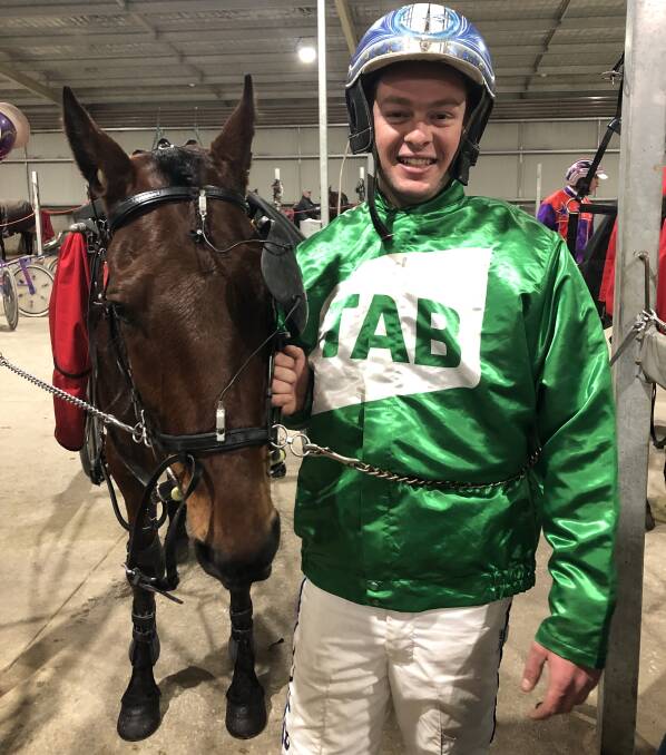 SURPRISED: Tom Pay, pictured with Izzy Watt, drove $21 outsider Mah Koo Loo Queen to victory on Wednesday night at the Bathurst Paceway. Photo: AMY REES