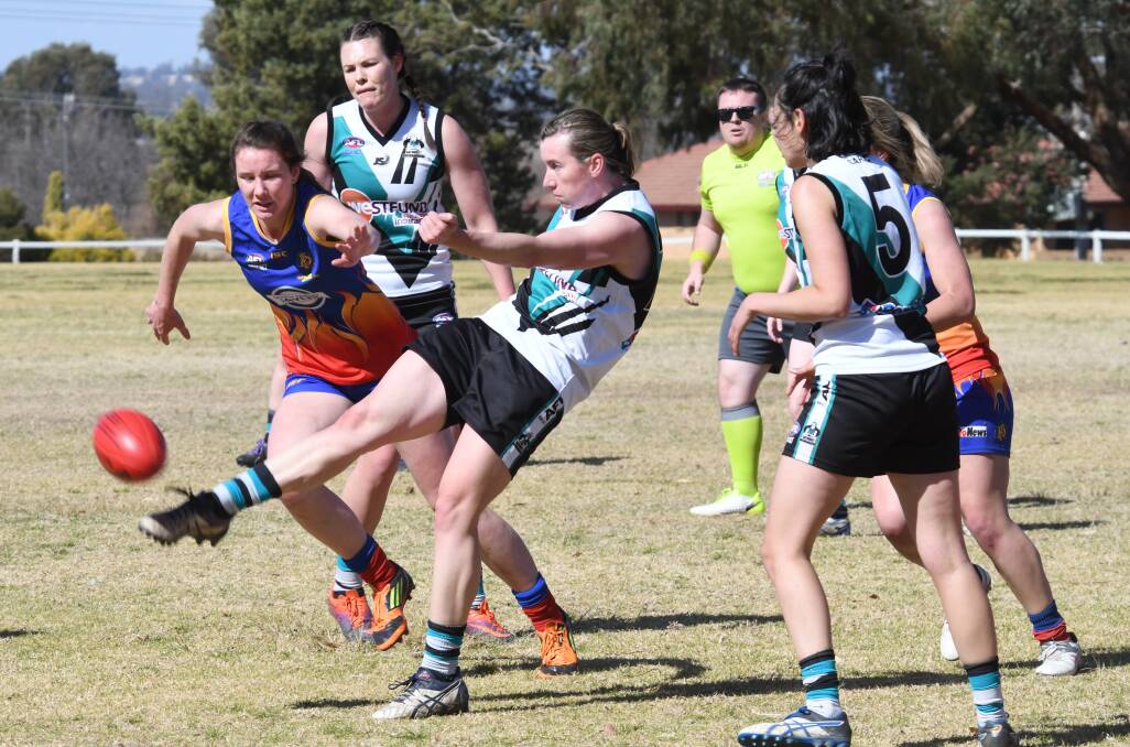 SINK THE BOOT IN: Keeghan Tucker pumps the ball forward for the Lady Bushrangers in Saturday's match against Dubbo. Photo: AMY McINTYRE