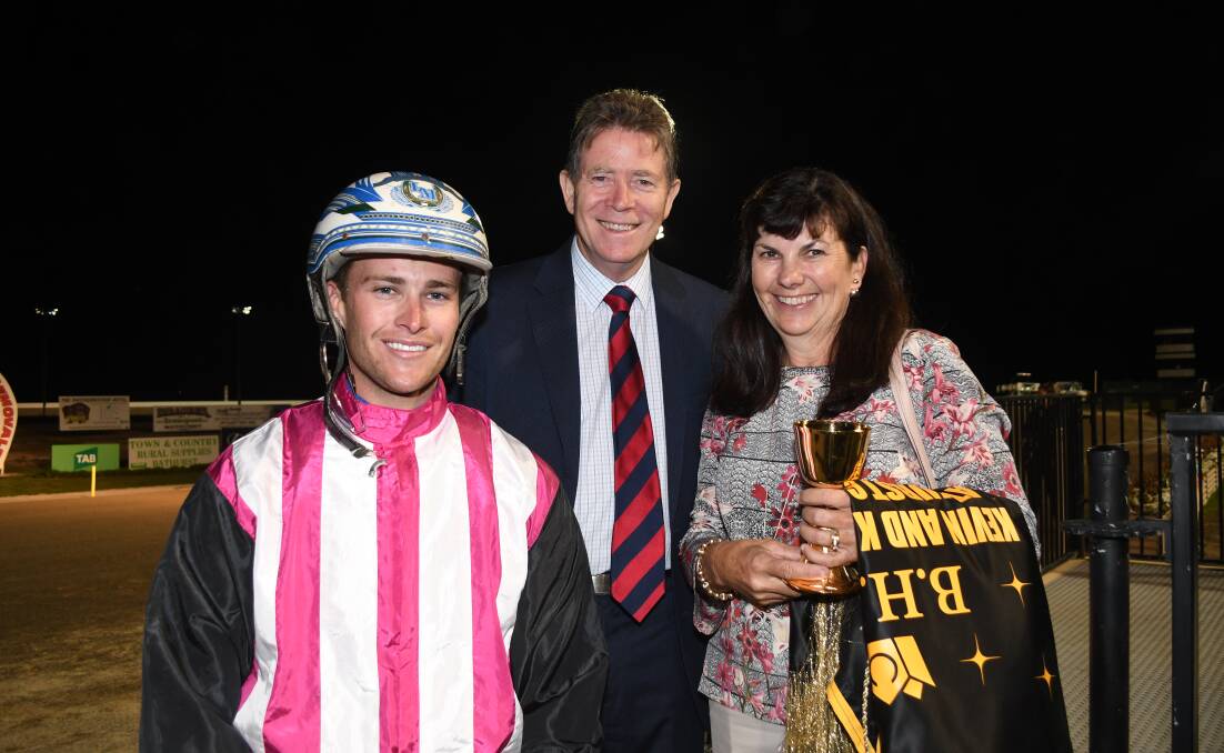 GOOD NIGHT OUT: Todd McCarthy with his mother Narelle and Harness Racing NSW CEO John Dumesny after his Gold Chalice win. Photo: CHRIS SEABROOK 033118crown5a