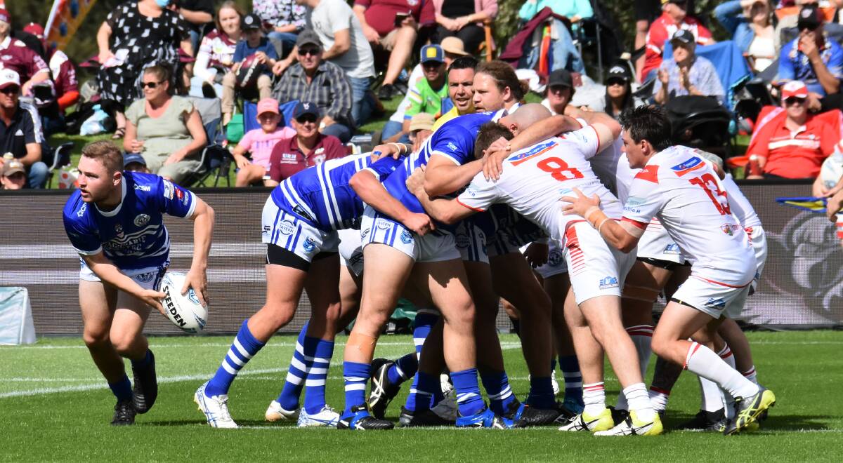 WATCHING PLAY: Referee Nathan Blanchard oversees a scrum in Saturday's Peter McDonald Premierships season opener between Dubbo Macquarie and the Mudgee Dragons. Photo: JAY-ANNA MOBBS