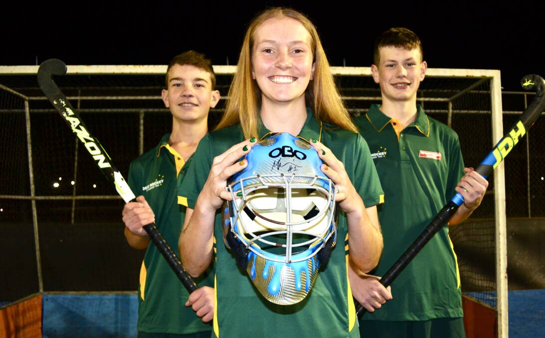BIG GOALS: Talented 14-year-old goalkeeper Georgia Baillie (centre) toured New Zealand then made her Central West Premier League Hockey debut.