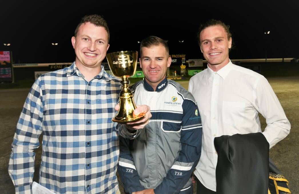 HAPPY LADS: Driver Luke McCarthy (centre) and Idyllic's syndicate members Brenton Kennedy and Adam Kennedy were delighted to win the Gold Chalice. Photo: CHRIS SEABROOK 032721crace6a