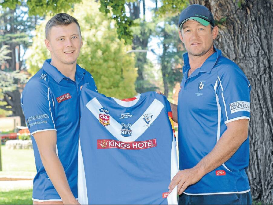 Joe Batchelor (left) is presented with a St Pat's playing jersey by coach Kurt Hancock in 2015. The talented back rower has now been named in England's Rugby League World Cup squad.