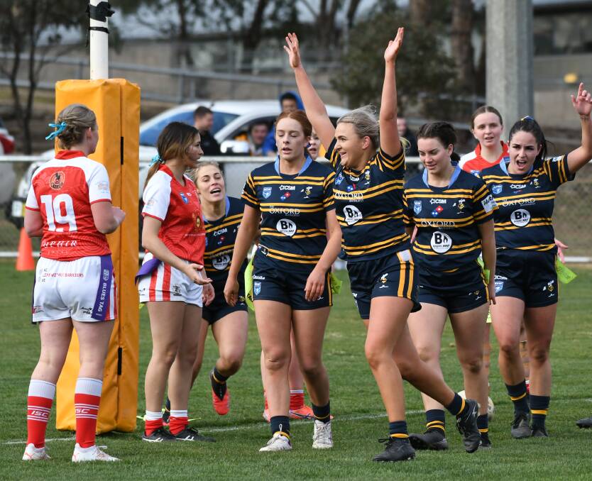THE JUBILATION: Lilly Phillips celebrates scoring her second grand final try for the Mungals. Photo: CHRIS SEABROOK