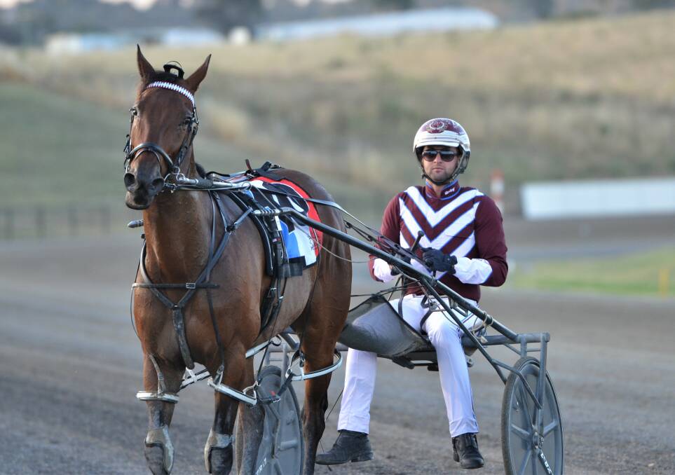 Jack Trainor continued his good run of results at the Bathurst Paceway when winning the Margaret Mawhood Memorial aboard Masons Delight. Picture by Anya Whitelaw