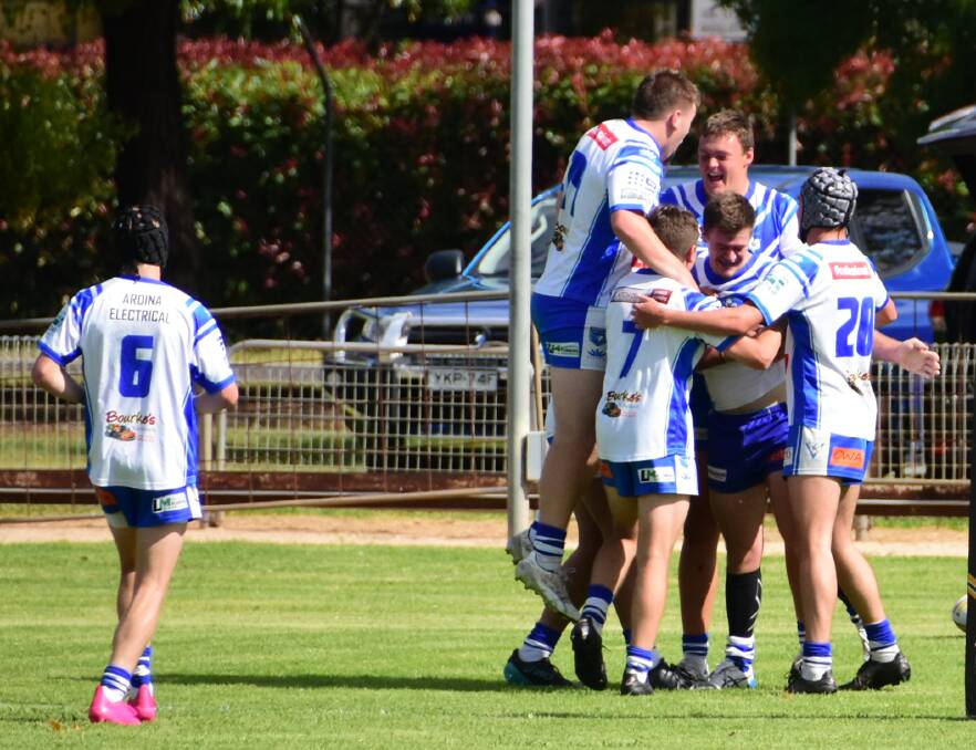 THE JUBILATION: The under 21s Saints celebrate after scoring a try - a scene they are hoping to emulate in Friday's grand final against Dubbo CYMS. It will be played at Jack Arrow Oval.